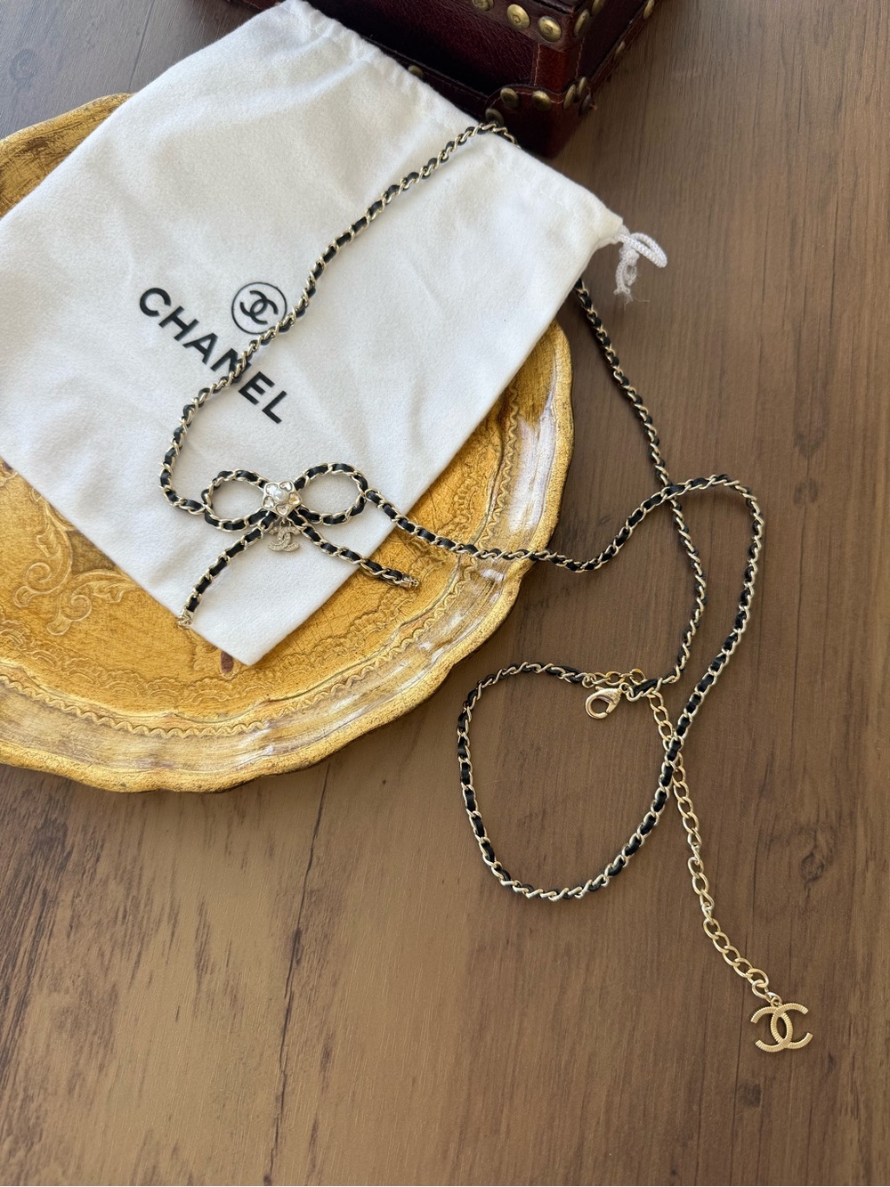 CHANEL Black and Gold Braided Chain Necklace with CC Charm